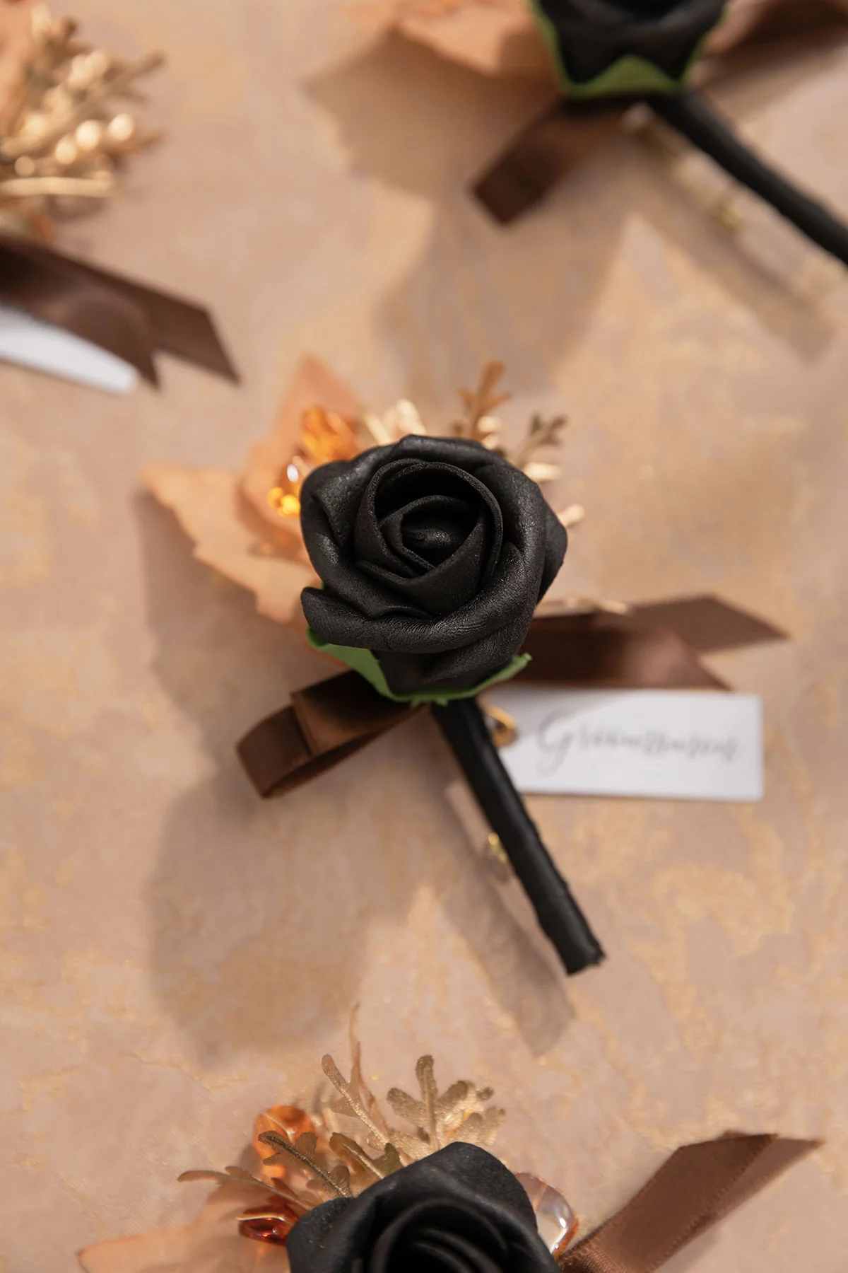 Boutonnieres in Black & Pumpkin Orange - Image 5