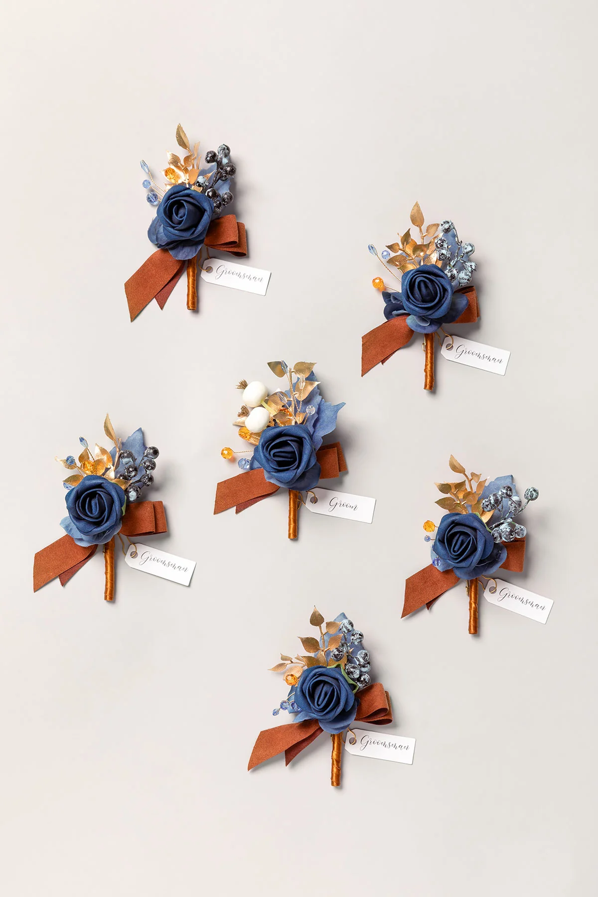 Boutonnieres in Russet Orange & Denim Blue