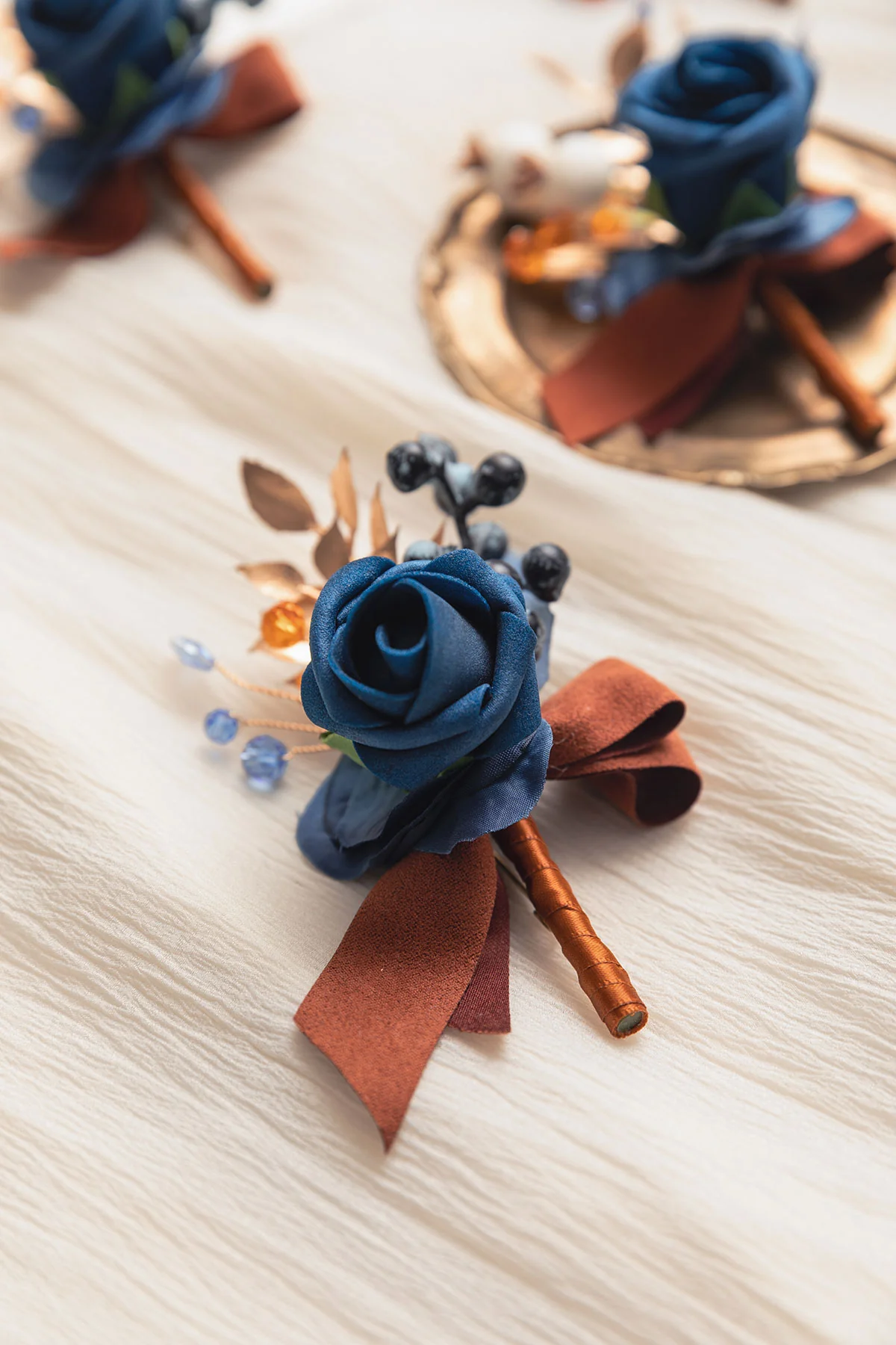 Boutonnieres in Russet Orange & Denim Blue - Image 4