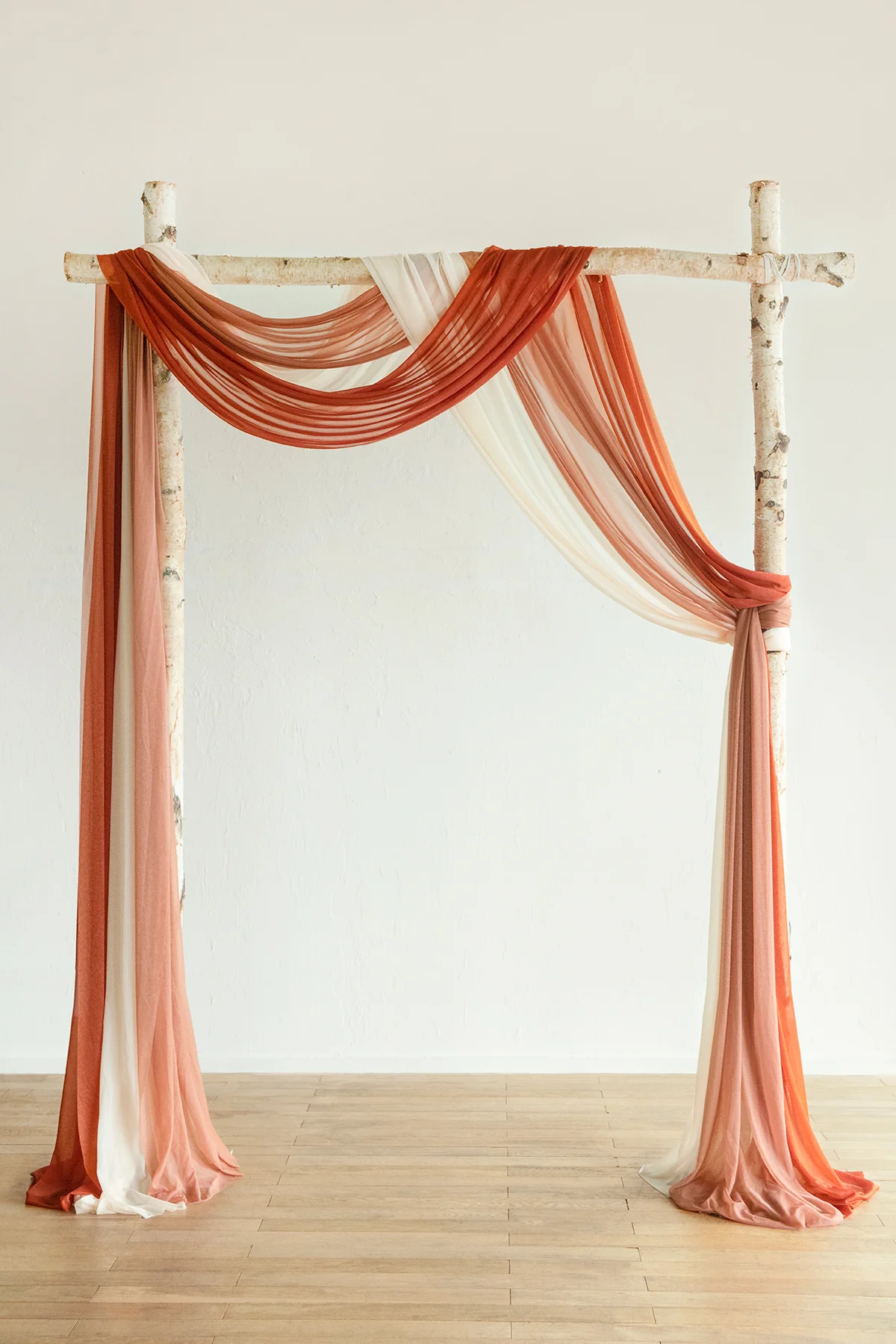 Wedding Arch Drapes in Burnt Orange & Scarlet | Clearance